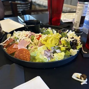a plate of salad on a table