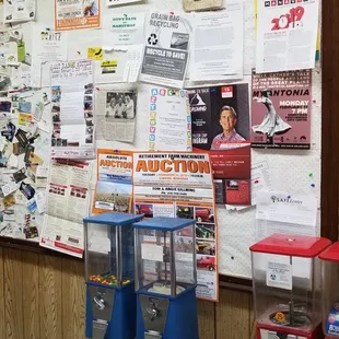 a bulletin board with many items on it