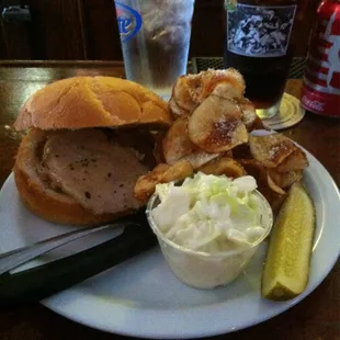 Thursday's special. Sliced pork sandwich, homemade chips, coleslaw and a dessert coming up!