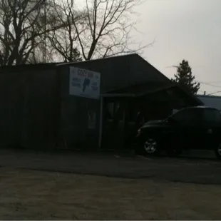 a truck parked in front of a building