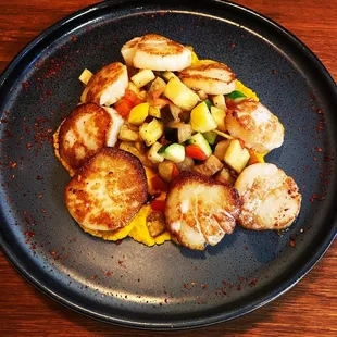 Scallops over butternut squash purée