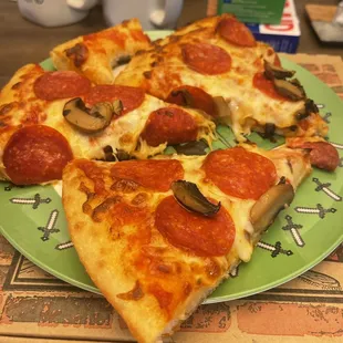 Pepperoni and mushroom (asked for toppings on top of cheese)
