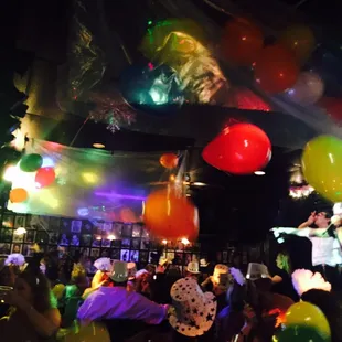 a crowd of people at a party