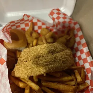 a basket of fish and fries