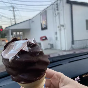Soft serve twist cone dipped in chocolate