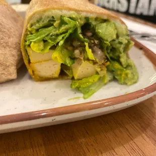 a plate with a sandwich on it