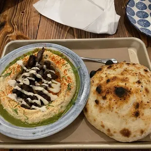 Hummus with crispy brick oven lamb shoulder