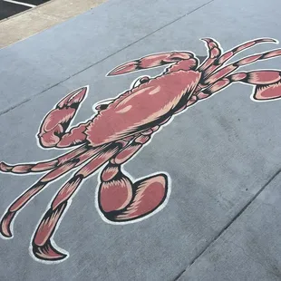 a crab on the sidewalk