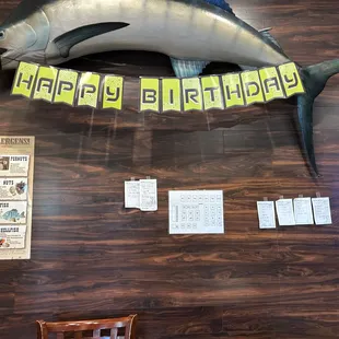 a large marlin fish mounted on the wall