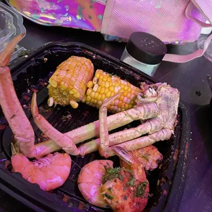 crab legs and corn on the cob