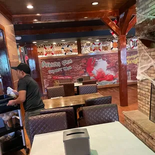 a man preparing food in a restaurant