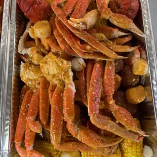 crab legs and corn on the cob