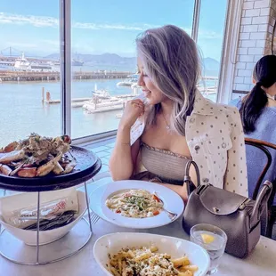 Crab chowder, crab caesar, garlic noodles and garlic roasted crab. Photo by @vintagedolls