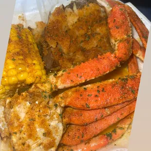crab legs and corn on the cob
