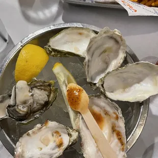 a plate of oysters and fries