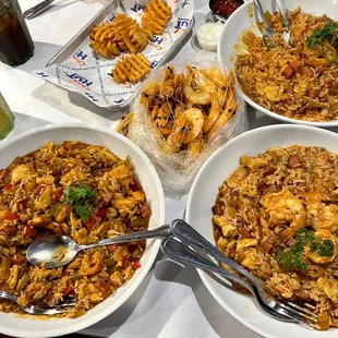 four bowls of food on a table