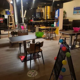 a restaurant with tables and chairs