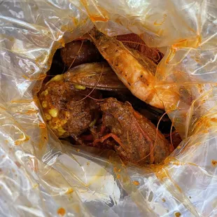 The Sampler comes with corn, mussels, crawfish, shrimp, sausage, potatoes