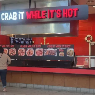 a woman standing at the counter