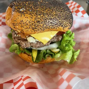 Blue-hoo burger, no tomatoes, add American cheese