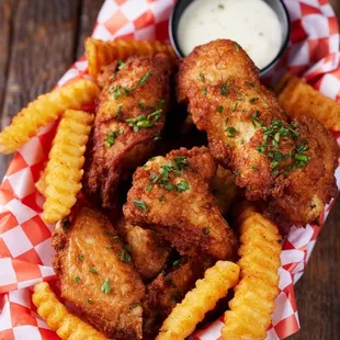a basket of deep fried crab n spice fries