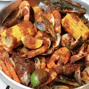 CNS COMBO  Mix and Match any 3lbs: Shrimp, green mussel, blue mussel, clam, and crawfish.  Includes: Corn, Sausage, and potatoes