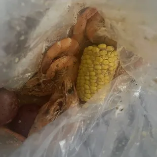 Head on shrimp in crab pack sauce