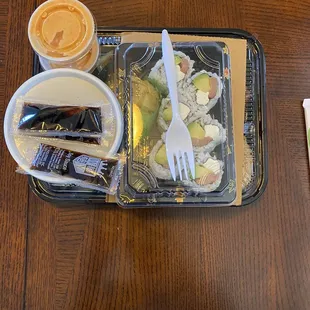 a tray of food and a drink