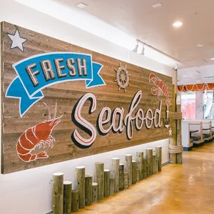 a sign for fresh seafood