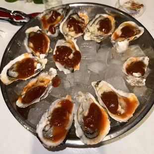 Fresh dozen oysters. They were unshucked