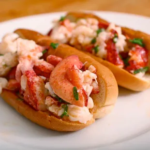 two hot dogs on a plate