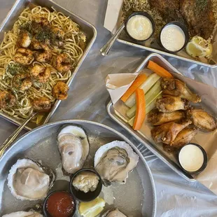Blackened salmon, oysters, cajun wings &amp; shrimp garlic noodles