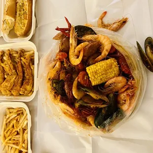 a variety of seafood dishes on a table