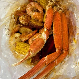 crab legs and corn on the cob