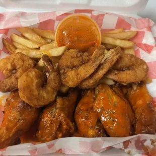 Buffalo Deep fried chicken wings and jumbo shrimp combo