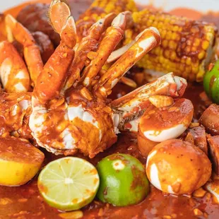 Dungeness legs + our delicious crabby crabby mix sauce...