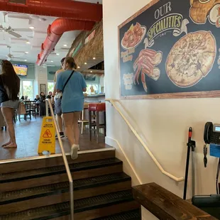 Lower level entry requires climbing 4 steps.  However, there is an elevator up to the second floor.