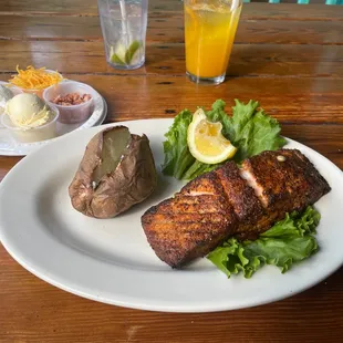 Blackened Salmon and Baked Potato with bacon, cheddar and sour cream