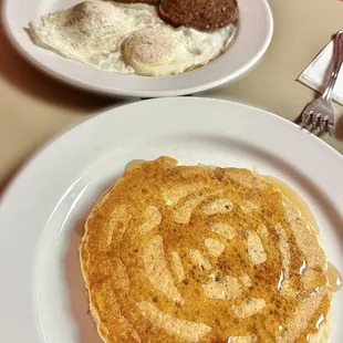 Two eggs. Side sausage. Side pancake.