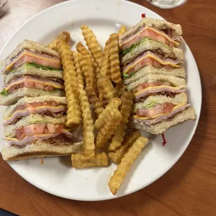 Club sandwich with extra crispy fries