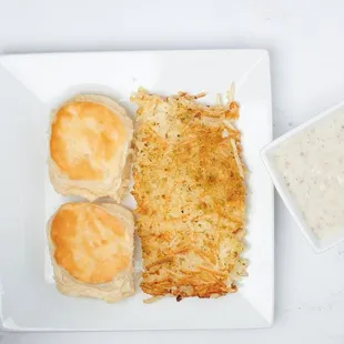 "Comfort on a Plate: Indulge in hearty biscuits smothered in savory sausage gravy."