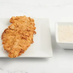 "Dig into Southern comfort with our Chicken Fried Chicken--crispy, juicy, and irresistibly delicious!"