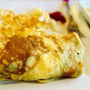 Chicken Florentine Crepe with a side of Hollandaise