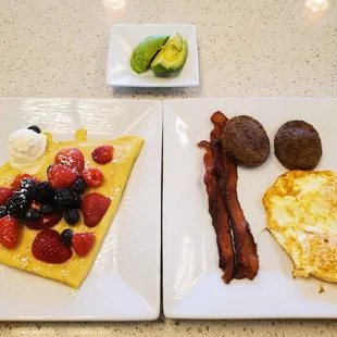 Breakfast combo with berry crepe
