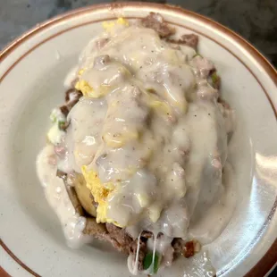 a plate of eggs and gravy