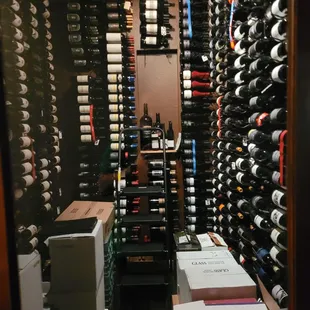 a wine cellar full of bottles
