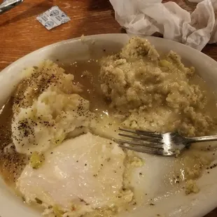 Turkey and dressing with mashed potatoes.