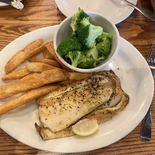 Rainbow trout with steak fries and steamed broccoli