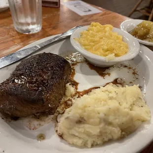 Grilled Sirloin Steak* with mashed potatoes, Macaroni n&apos; Cheese and Fried Apples