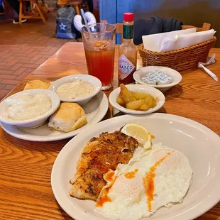a plate of food and a drink
